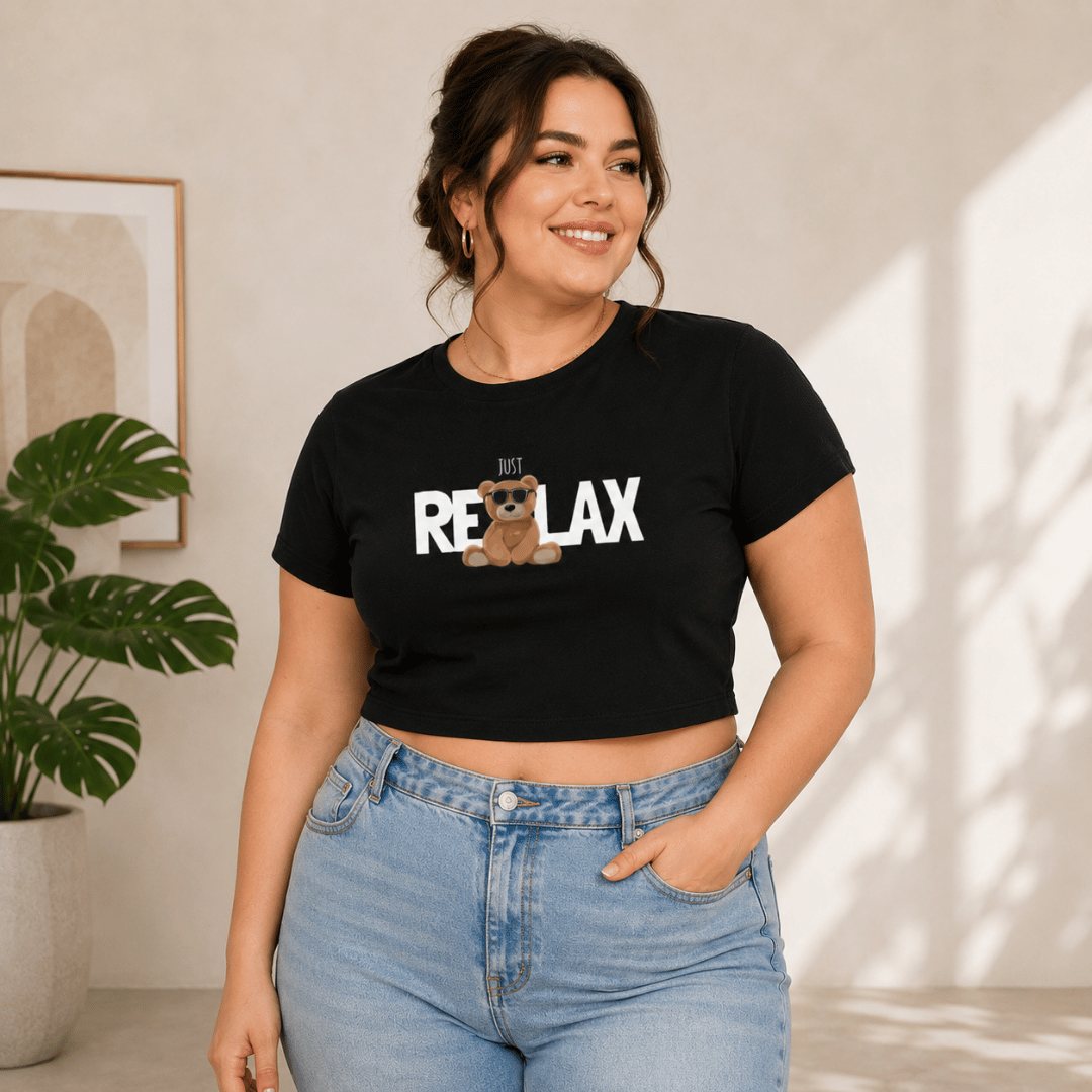 Just Relax black baby tee for women by Thread Evoke — plus size cropped graphic tee in 95% cotton spandex, styled with light blue denim jeans