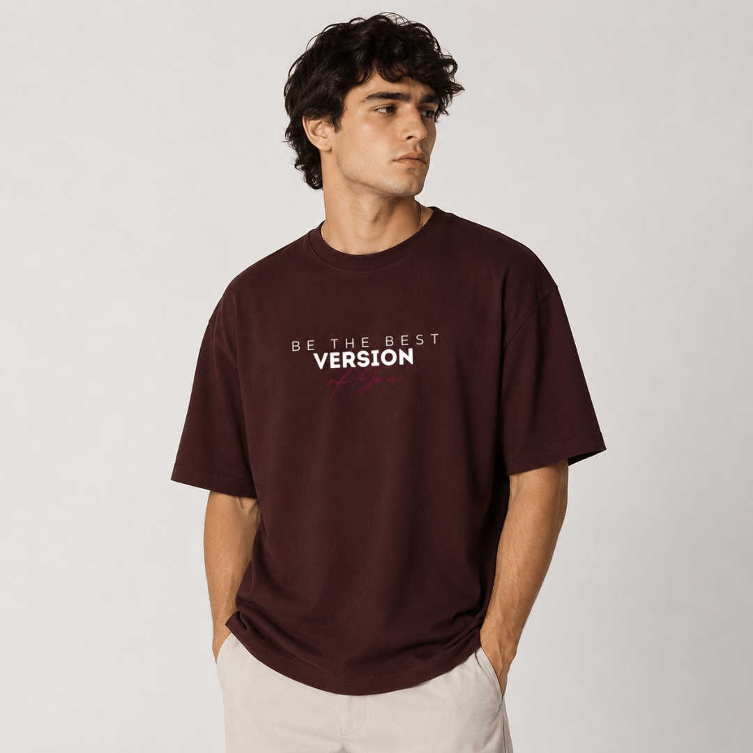 Men's oversized maroon t-shirt with Be The Best Version of You print – Thread Evoke 240 GSM heavyweight cotton tee, front view on male model