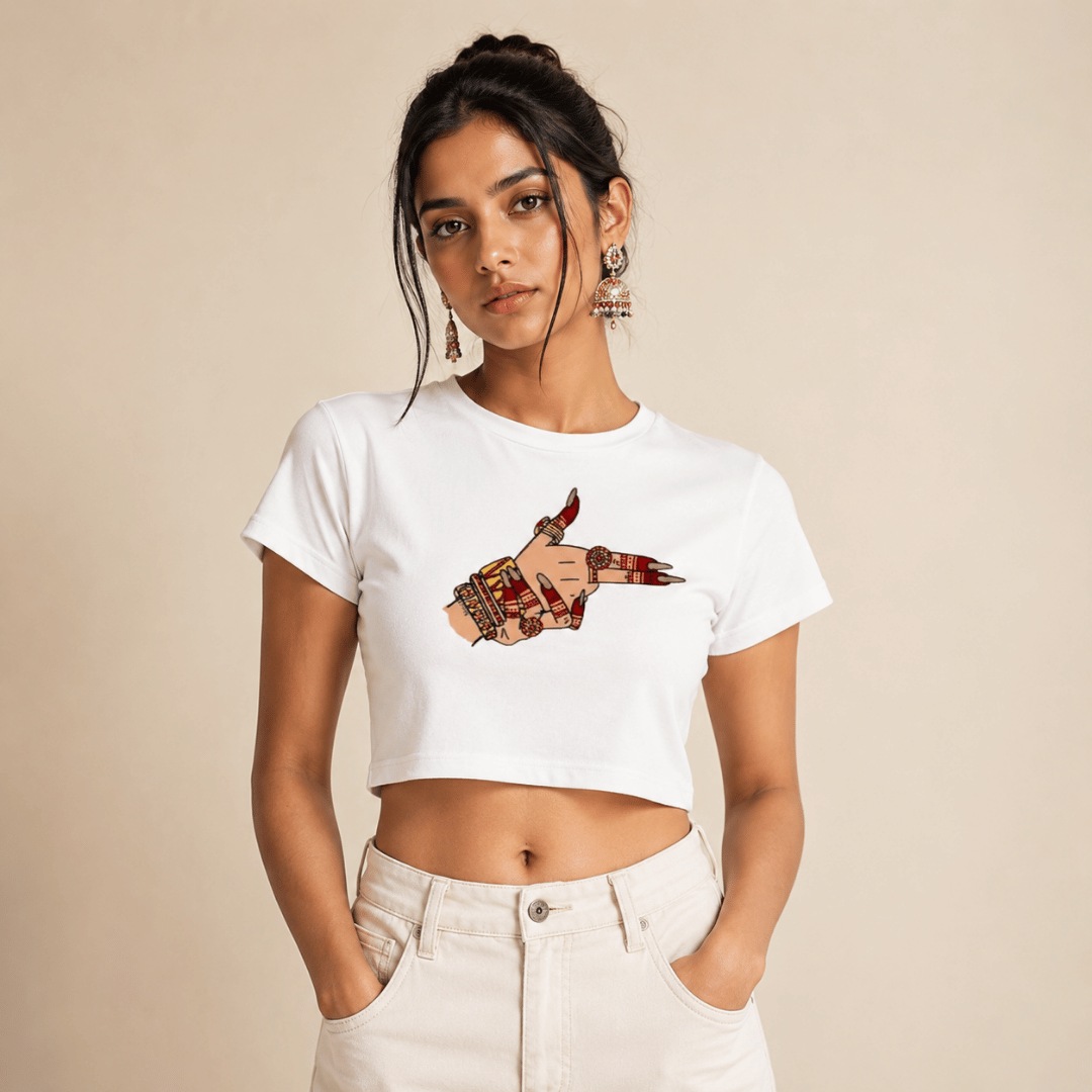 Woman wearing Thread Evoke white desi graphic crop top with mehndi hand print and gold jhumka earrings