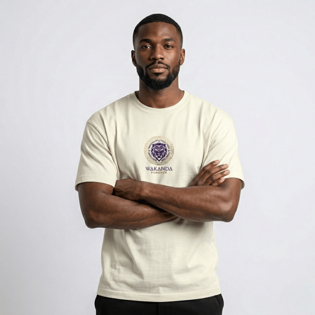 Man wearing Wakanda Forever off-white graphic T-Shirt — arms crossed, purple lion mandala print, 100% cotton regular fit tee