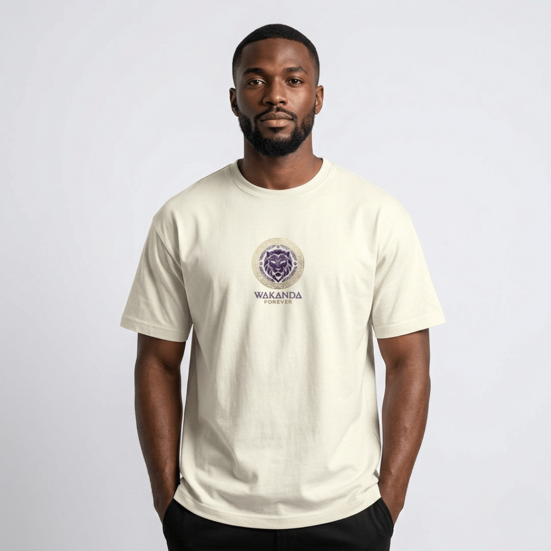 Man wearing Wakanda Forever T-Shirt for Men — off-white 100% cotton graphic tee with purple lion mandala, relaxed regular fit