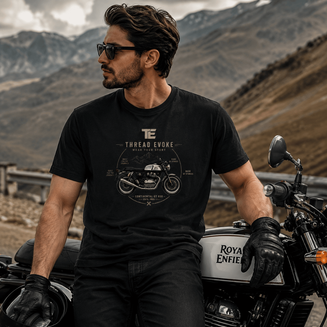 Men's Continental GT 650 rider t-shirt by Thread Evoke — cafe racer graphic tee worn by biker posing with Royal Enfield on mountain road